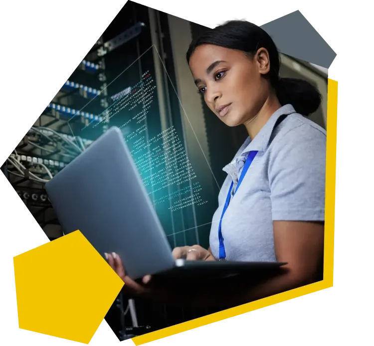 IT and cloud services for companies IT specialist monitors servers and data in the AM data centers using her laptop