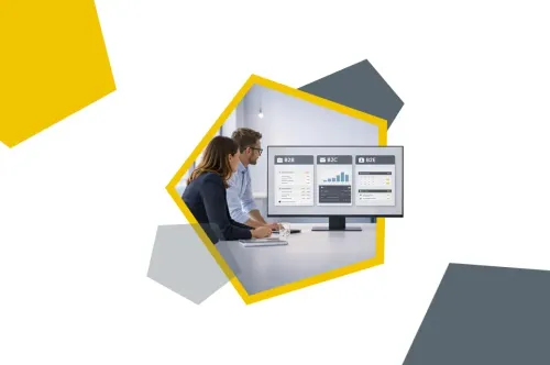 Zwei Mitarbeitende sehen sich verschiedene digitale Plattformen auf einem Bildschirm an.